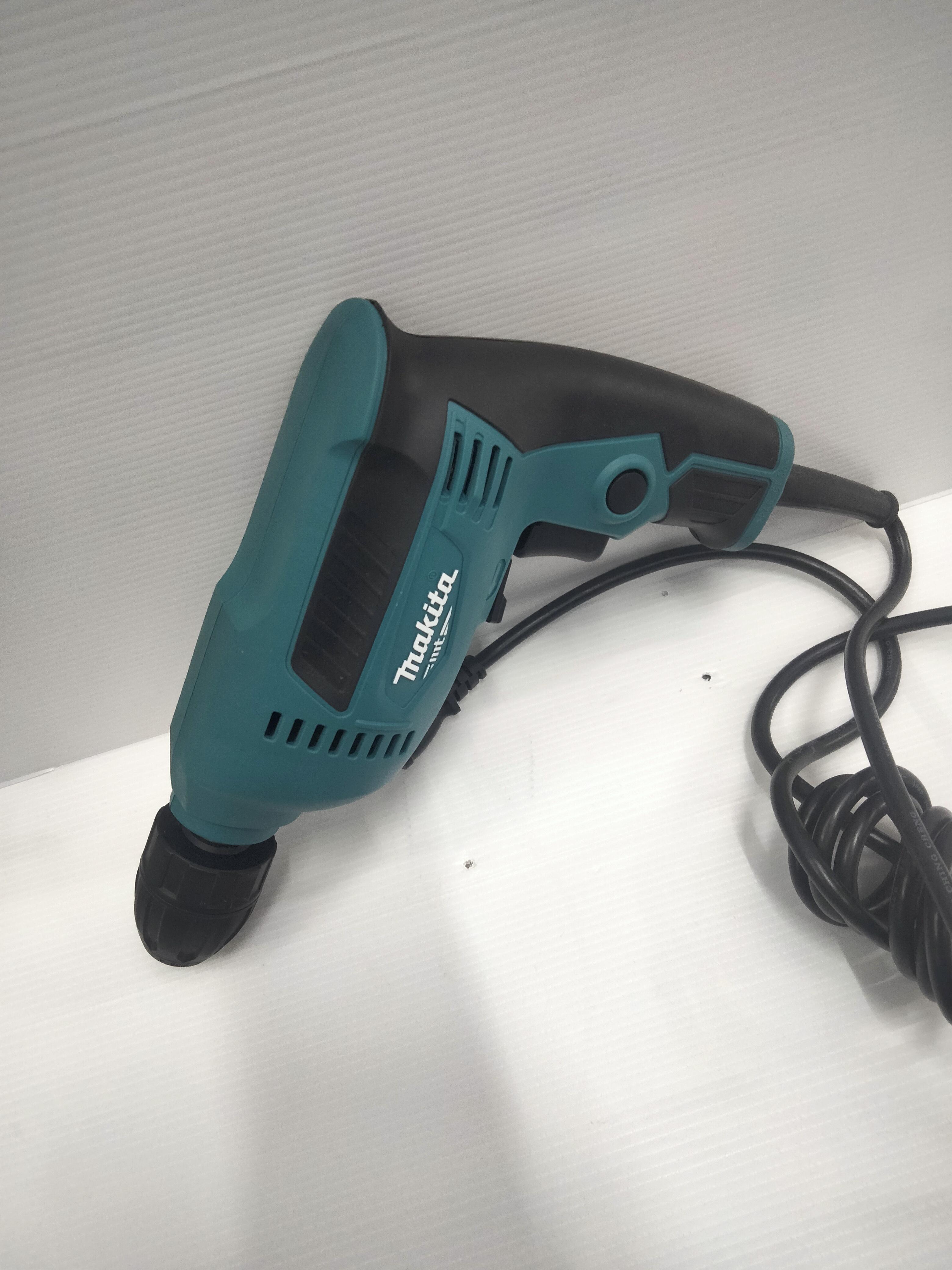 MAKITA สว่านไฟฟ้า KEYLESS M6002B (450W) 3/8นิ้ว